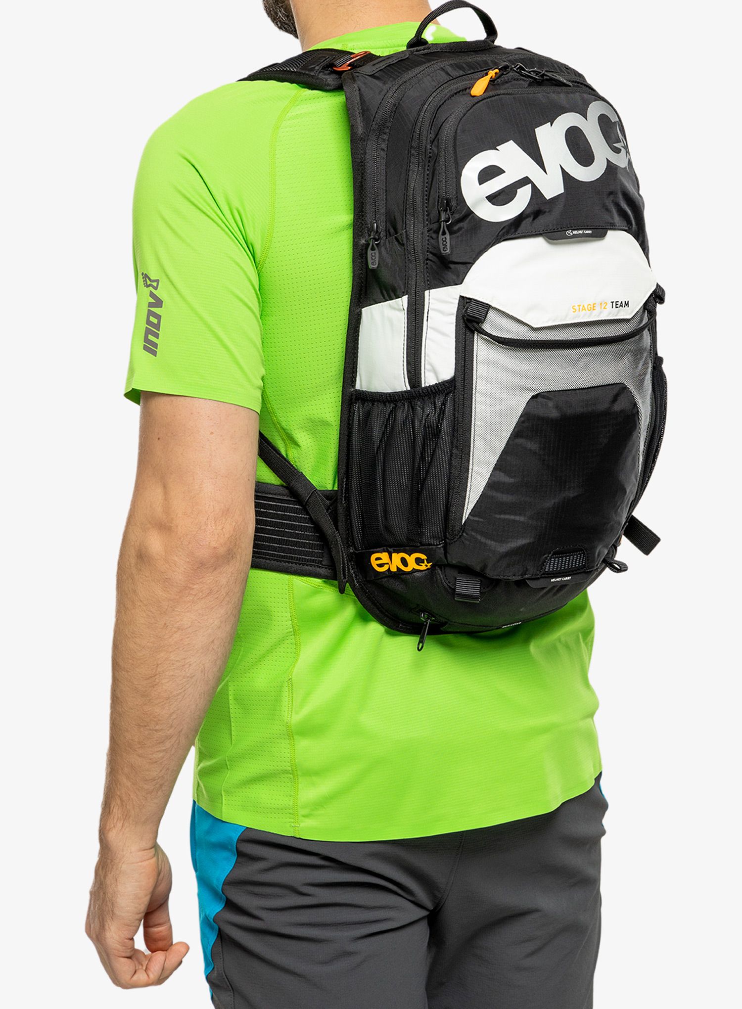 Велорюкзак Evoc Stage 12 - black/white/neon orange
