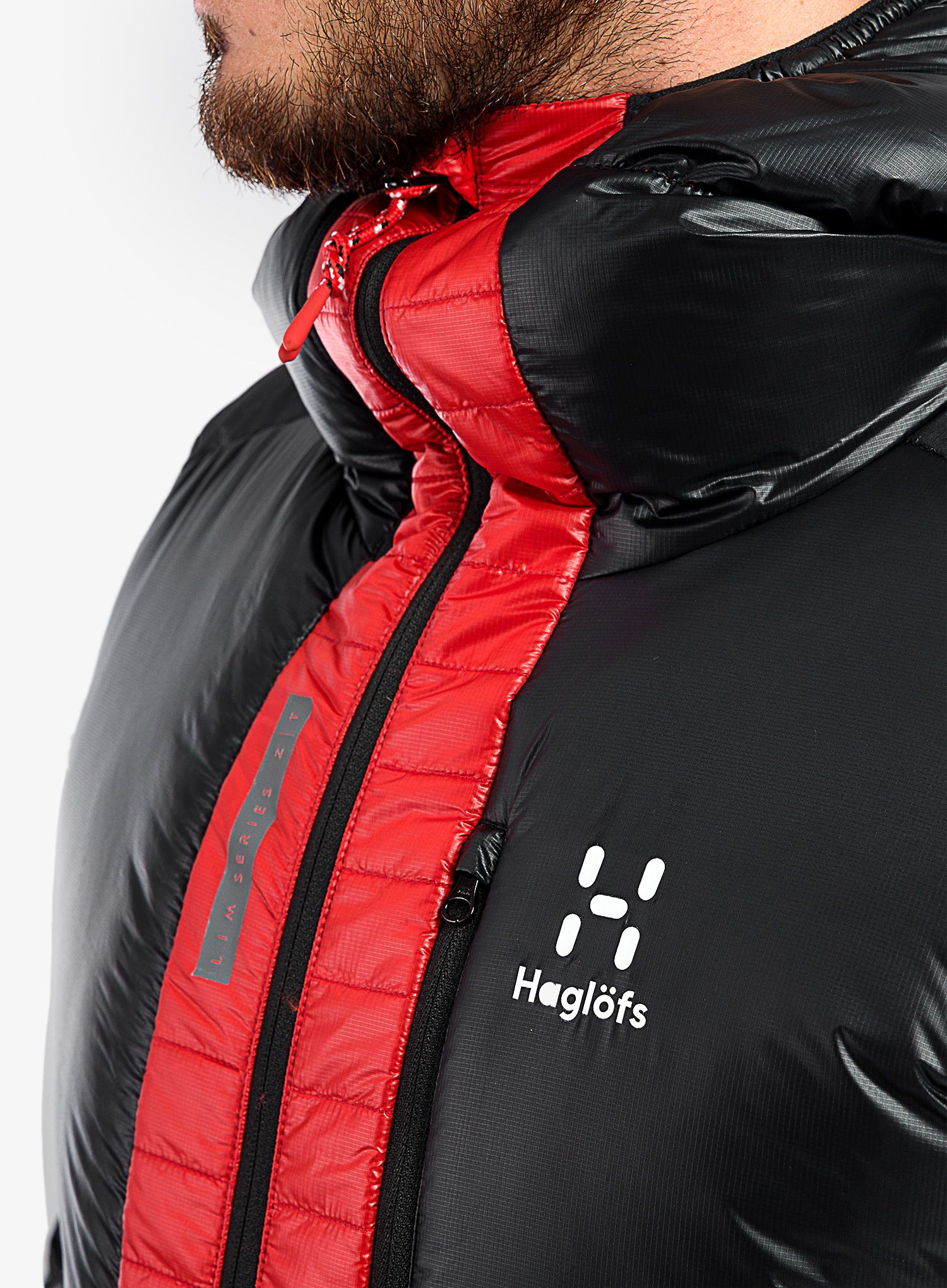 Пуховик Haglofs L.I.M ZT Down Jacket - true black/zenith red