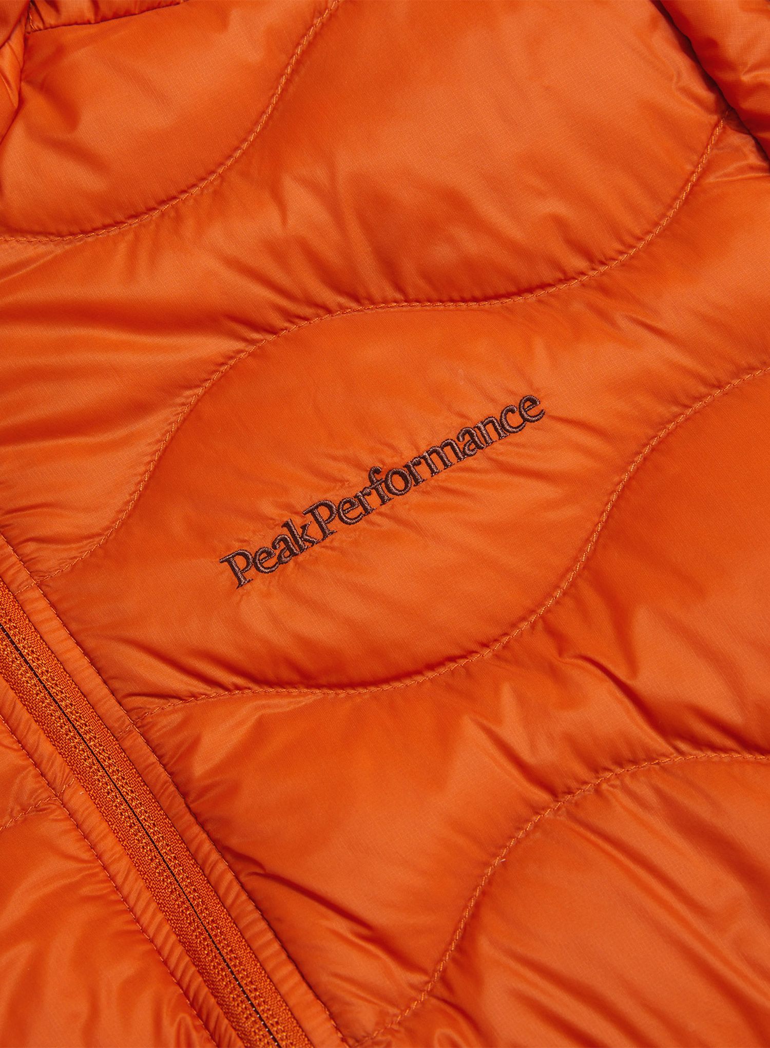 Пуховик Peak Performance Helium Down Hood Jacket - gold flame