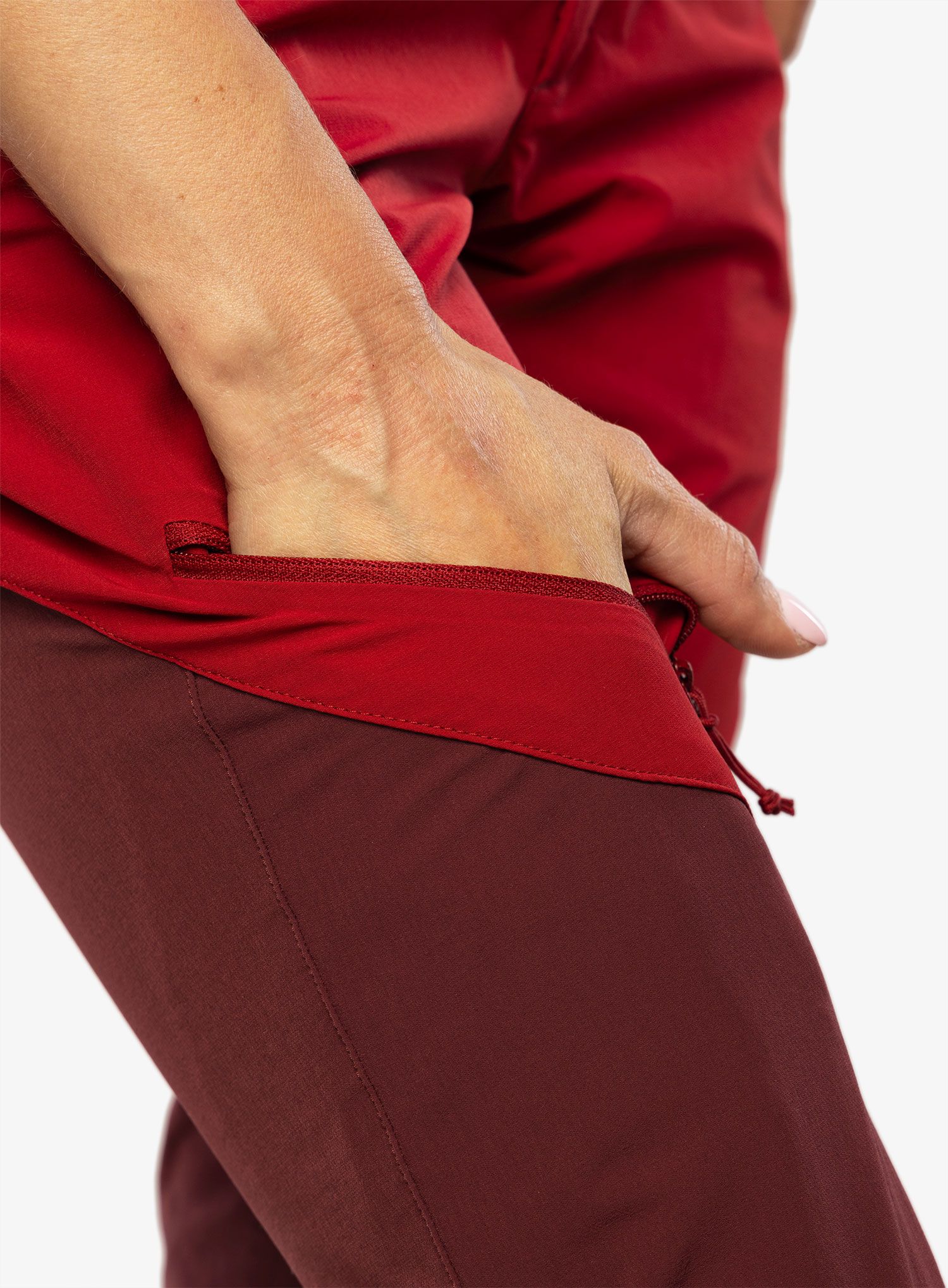 Штани жіночі Rab Torque Mountain Pants - crimson/deep heather